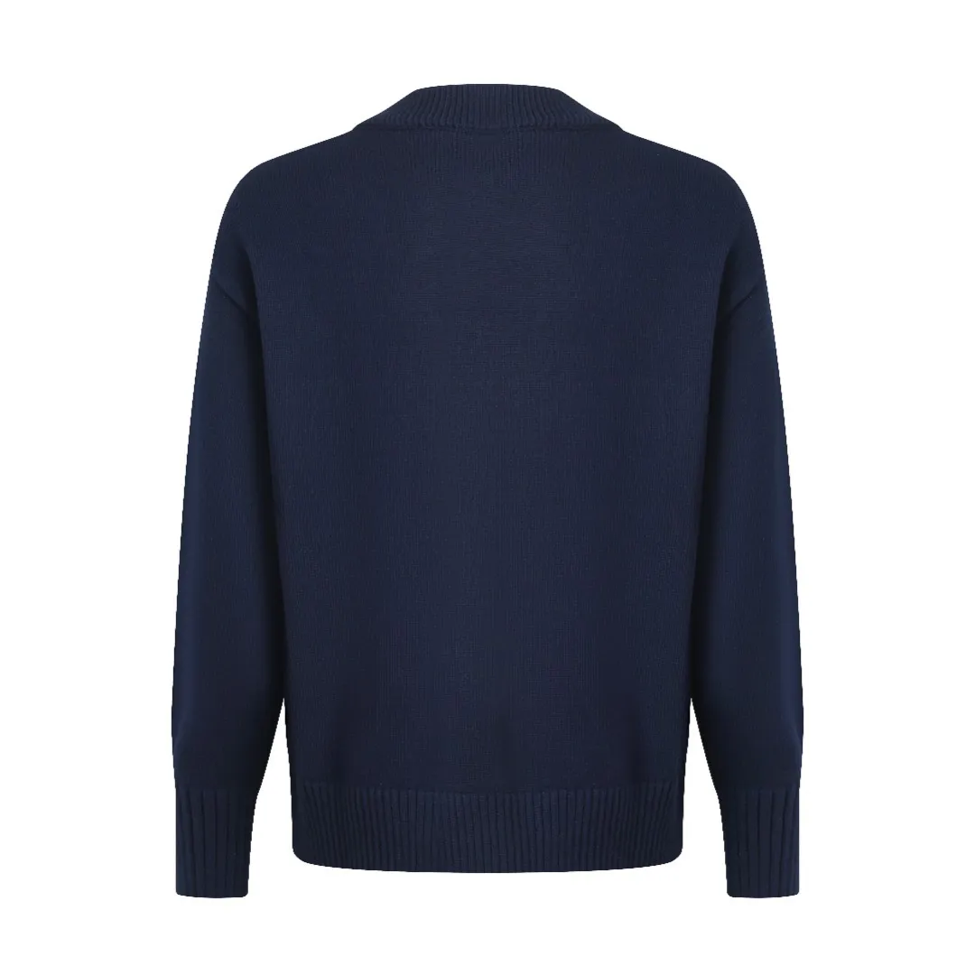 Ami love V-neck knitted cardigan is made of four-dimensional blended yarn of selected wool + cotton and nylon spandex. Each strand of yarn has undergone a "triple compound twisting" process. The wool provides natural warmth and fluffy feeling. After descaling treatment, combined with the smoothness of cotton fiber, it is close to the skin without any itch and is friendly to sensitive skin. The addition of nylon and spandex increases the fabric's rebound properties by 40%, making it less likely to wrinkle after long-term wear, and it still maintains its fluffy silhouette after machine washing. After blending, it feels soft and waxy, breaking the rough impression of traditional wool. The ADC pattern on the chest uses double-layer jacquard technology and is woven with milky white yarn. The stitch length changes to form a "cloud-like" three-dimensional texture. The edge of the pattern adopts "gradient narrowing" technology. The density of stitches from the center to the edge is from dense to sparse, giving a hazy feeling of natural smearing. The weight of the yarn in the jacquard area is 280g/m², which is 20% higher than the main body of the garment. It feels thick and full, highlighting the relief texture of the pattern. The neckline, cuffs, and hem are all made of thickened ribs, and the stitch density reaches 12 stitches per centimeter, forming a tight and elastic closing. The rib edges are added with 1% spandex and processed with "pre-shrinking and shaping" to ensure that they will not loosen or deform after multiple washings. The neckline is a V-neck design with an angle of 60°, and is paired with double-layered ribbing, which not only modifies the neck line but also enhances wearing stability. It adopts an Oversize silhouette, with the length reaching to the hips, and the overall lines are round and smooth. The two sides of the body are "slightly tightened" to retain the waistline while being loose and avoid feeling bloated. Size:S-M-L-XL